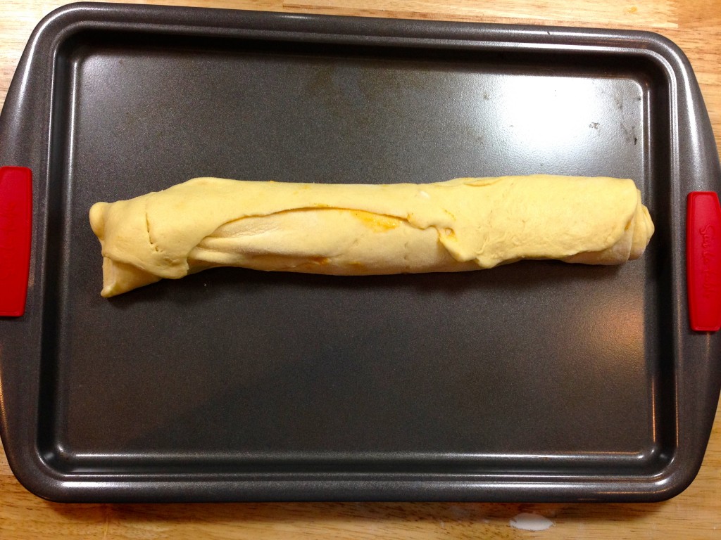 Roll the filled dough into a log and chill for 2 hours. #Pumpkin #Cheesecake #Crescent #Rolls