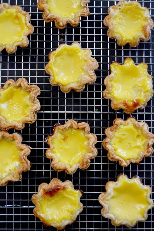 Hong Kong Egg Tarts - a popular pastry in China, Taiwan, Macau, Hong Kong and at dim sum restaurants. An easy and delicious taste of Asia! | www.thehungrytravelerblog.com