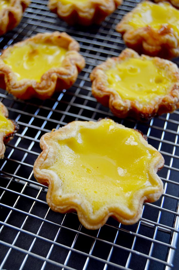 Hong Kong Egg Tarts - a popular pastry in China, Taiwan, Macau, Hong Kong and at dim sum restaurants. An easy and delicious taste of Asia! | www.thehungrytravelerblog.com