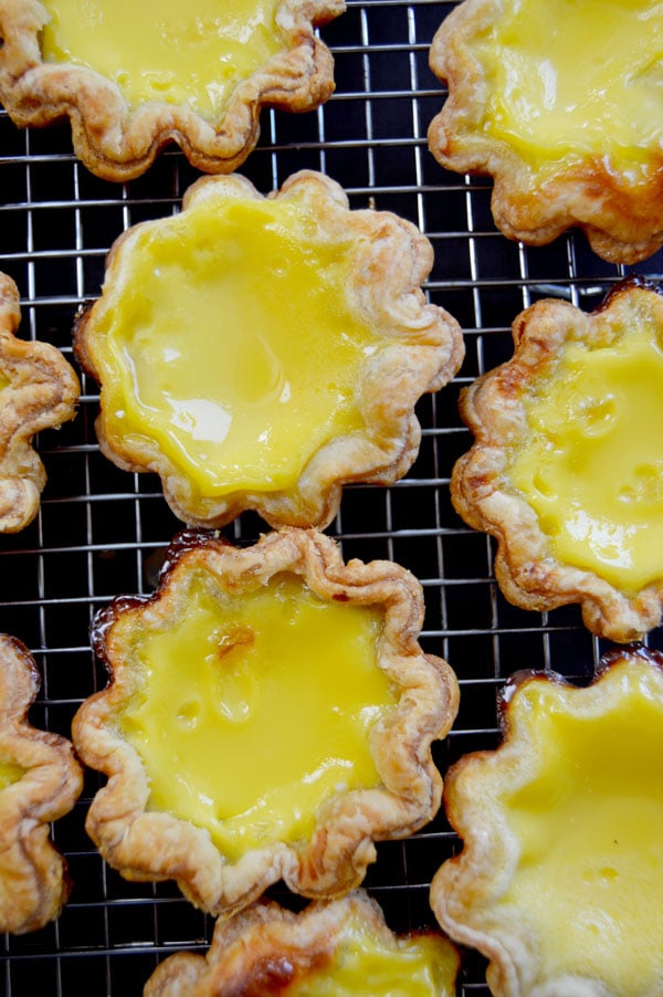 Hong Kong Egg Tarts - a popular pastry in China, Taiwan, Macau, Hong Kong and at dim sum restaurants. An easy and delicious taste of Asia! | www.thehungrytravelerblog.com