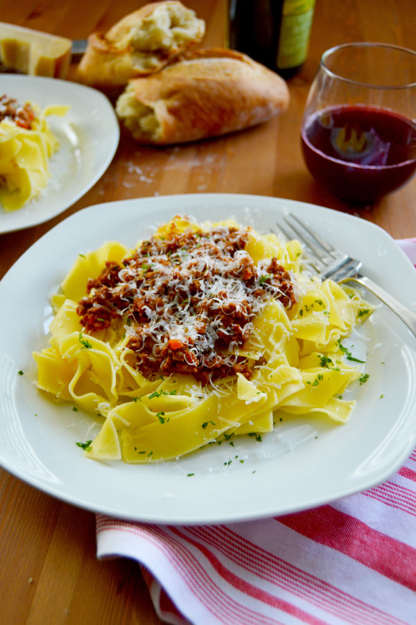 Ragu Alla Bolognese - the classic slow-cooked Italian meat sauce made from a trio of pork, beef, and proscuitto. | www.thehungrytravelerblog.com