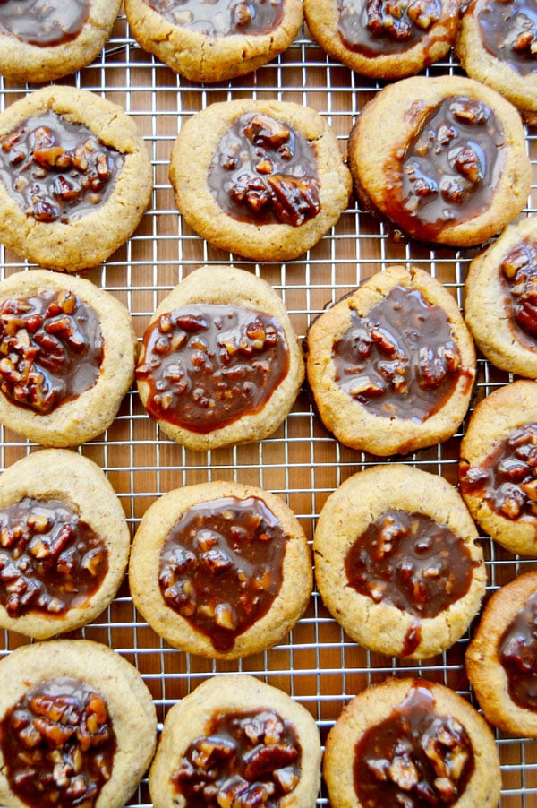 Kentucky Derby Cookies - pecan shortbread thumbprints filled with pecans, bourbon, and chocolate. A fun take on the traditional Derby Pie. Perfect for parties! | www.thehungrytravelerblog.com