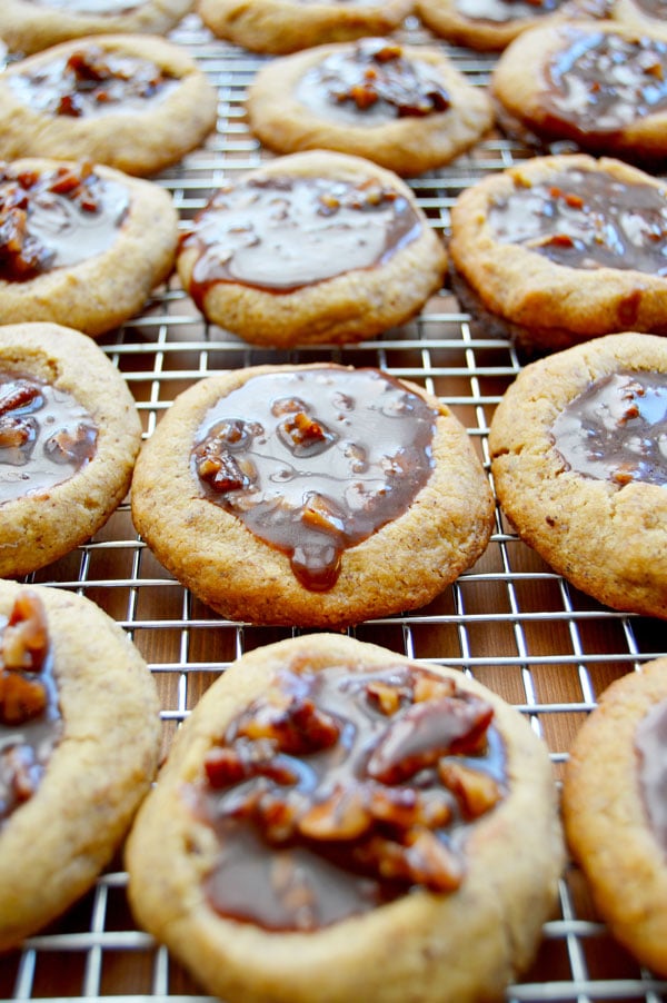 Kentucky Derby Cookies - pecan shortbread thumbprints filled with pecans, bourbon, and chocolate. A fun take on the traditional Derby Pie. Perfect for parties! | www.thehungrytravelerblog.com