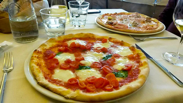 Pizza in Italy -- Meet Missy Hanley: International nurse, seasoned traveler, and food and drink lover. | The Hungry Traveler Interview Series | www.thehungrytravelerblog.com