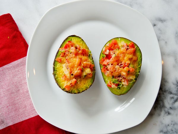 Baked Avocado - Take an avocado, filled it with pico de gallo, top it with shredded cheese and baked until melty and warm. Delicious and healthy! 