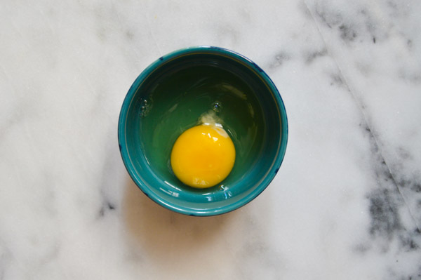 Tips for Better Baking - Crack eggs into a dark bowl to easily spot pieces of shell | www.thehungrytravelerblog.com