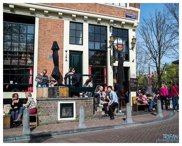 Enjoying a sunny day on the patio at Cafe Papeneiland | Eating Amsterdam Food Tour - Jordaan Food and Canals Tour 