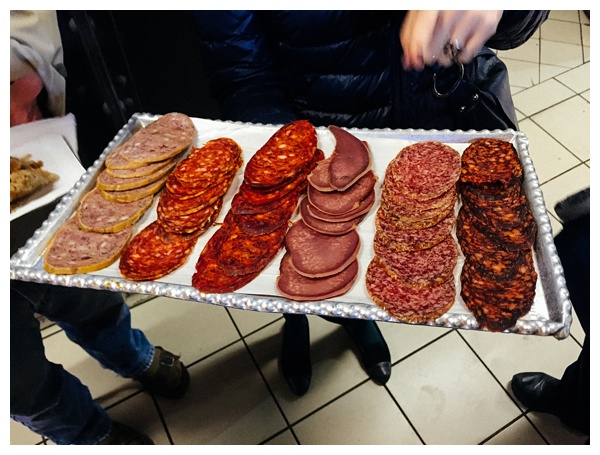 Sampling different sausages on the Taste Hungary Budapest Food Tour