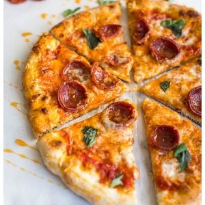 Hot Honey and Soppressata Pizza is an unexpected but perfect twist on a traditional pizza. Sweet, spicy and completely mind-blowing!