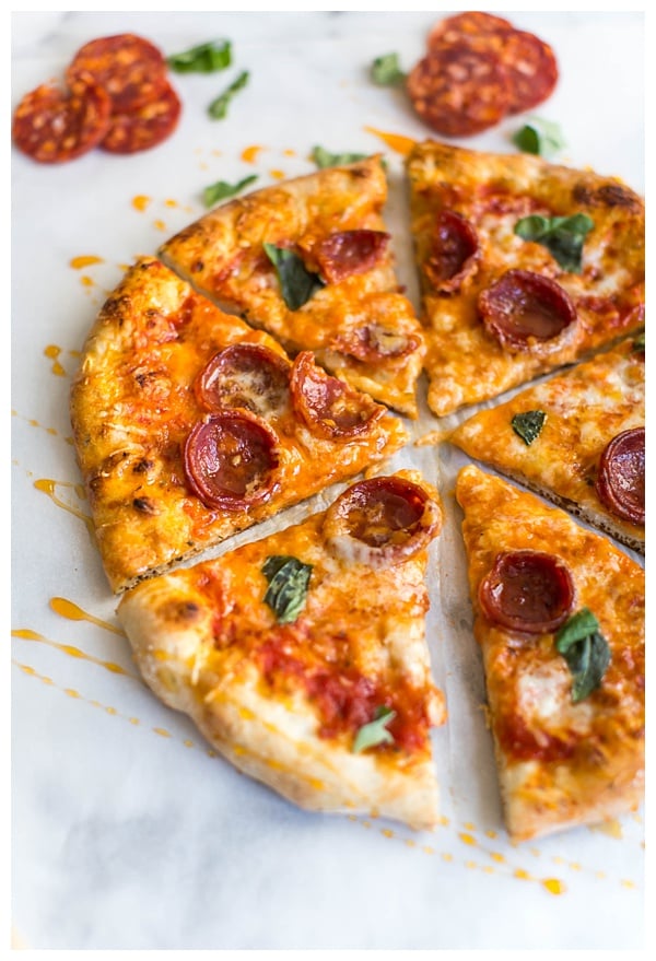 Hot Honey and Soppressata Pizza is an unexpected but perfect twist on a traditional pizza. Sweet, spicy and completely mind-blowing! 