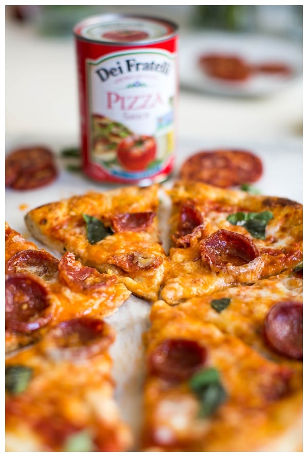 Hot Honey and Soppressata Pizza is an unexpected but perfect twist on a traditional pizza. Sweet, spicy and completely mind-blowing! 