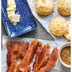 Sweet and Spicy Bacon inspired by the famous Chronic Bacon at Nashville's Biscuit Love. A rub of brown sugar, cayenne pepper & spices make this bacon sweet, spicy & smokey.