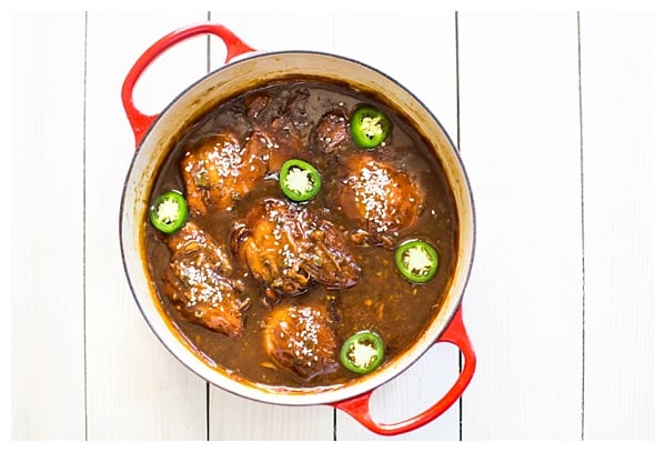 Vietnamese Caramel Chicken -- chicken thighs braised in a sweet and spicy caramel sauce with jalapeños, ginger, and scallions. Serve it with steamed veggies and rice and it's a perfect weeknight dinner. 