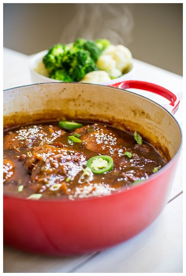 Vietnamese Caramel Chicken -- chicken thighs braised in a sweet and spicy caramel sauce with jalapeños, ginger, and scallions. Serve it with steamed veggies and rice and it's a perfect weeknight dinner. 