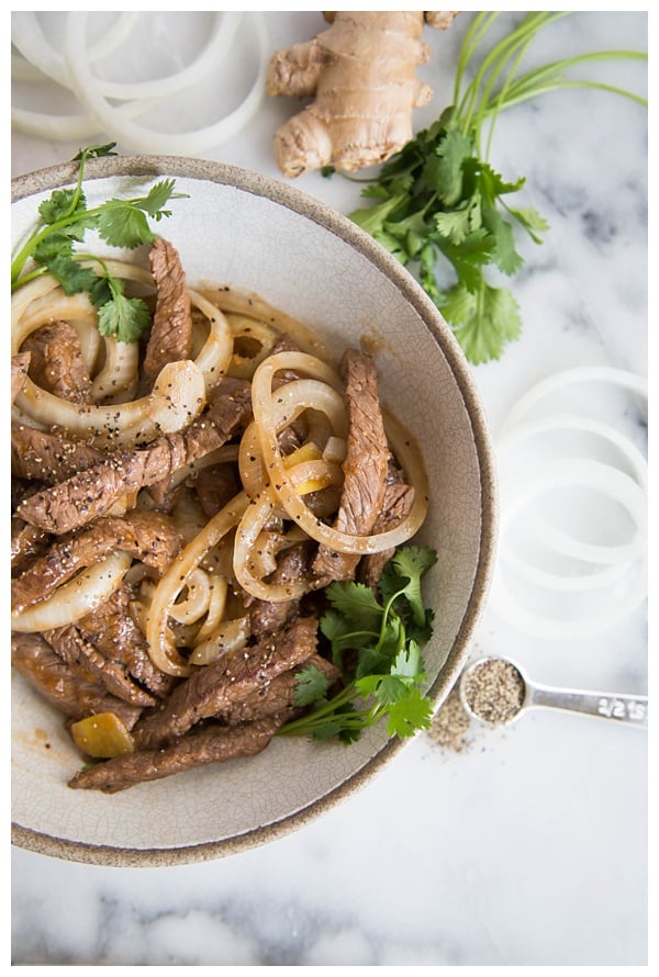 Stir-Fried Beef with Black Pepper is an easy stir-fry made with coarsely cracked black pepper, onions, and oyster sauce. Serve with rice and a cucumber salad for wonderful authentic Chinese meal! 