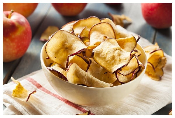 Baked apple chips are a healthy and delicious snack to take along on a road trip or any travel situation. They are easy to make and transport! 