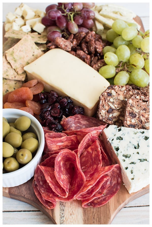 Nothing compares to a great cheese board! Learn how to make a cheese board -- from choosing cheeses & picking accompaniments to composing it all on a board! 