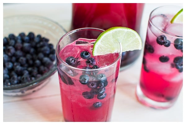 Sparkling Blueberry Lime Tequila Punch is a festive cocktail to serve at any holiday party. With only 5 ingredients, mix up a big batch and enjoy the party!