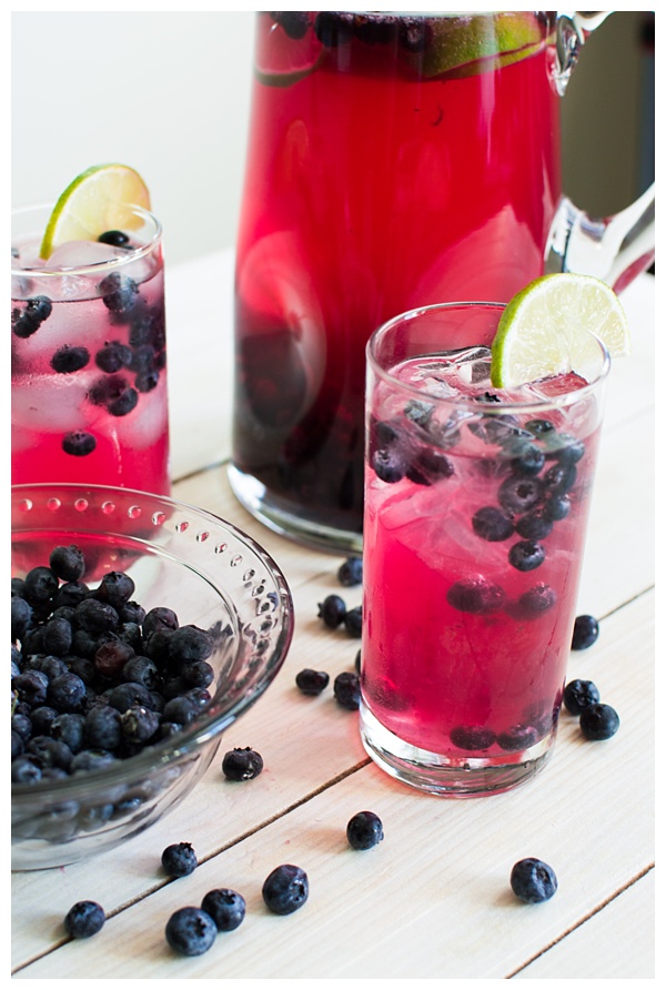 Sparkling Blueberry Lime Tequila Punch is a festive cocktail to serve at any holiday party. With only 5 ingredients, mix up a big batch and enjoy the party!