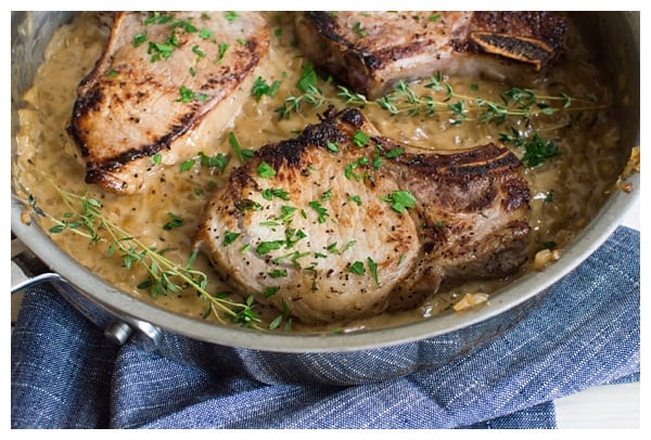 Apple Cider Marinated Pork Chops with Apple Pan Sauce -- Pork chops marinated in apple cider, seared and roasted & finished with a creamy apple pan sauce.