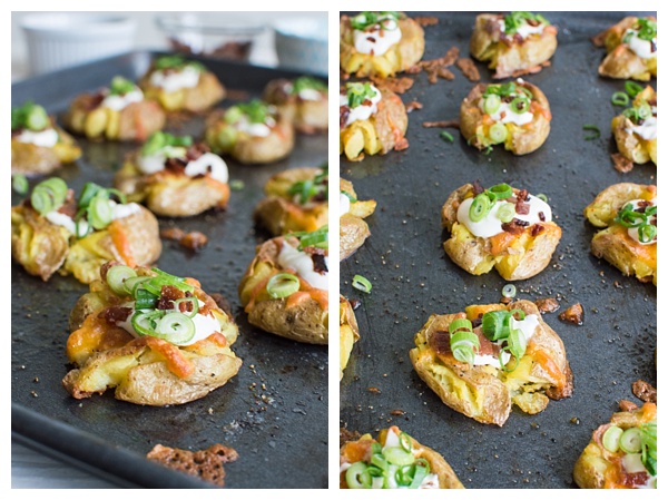 Loaded Smashed Potatoes -- crispy smashed potatoes topped with cheddar cheese, bacon, sour cream, and scallions. A fun side dish or perfect party appetizer!