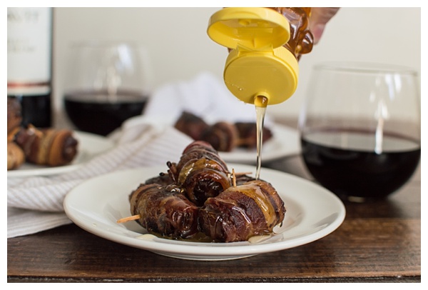 Bacon-Wrapped Dates -- Dates are stuffed with Manchego cheese and slivered almonds, then wrapped in bacon and drizzled with honey. Perfect party appetizer! 