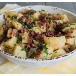 German Potato Salad is a sweet and sour potato salad with bacon, onion and fresh herbs. It's best served warm or at room temperature.