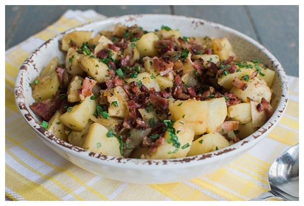 German Potato Salad is a sweet and sour potato salad with bacon, onion and fresh herbs. It's best served warm or at room temperature. 